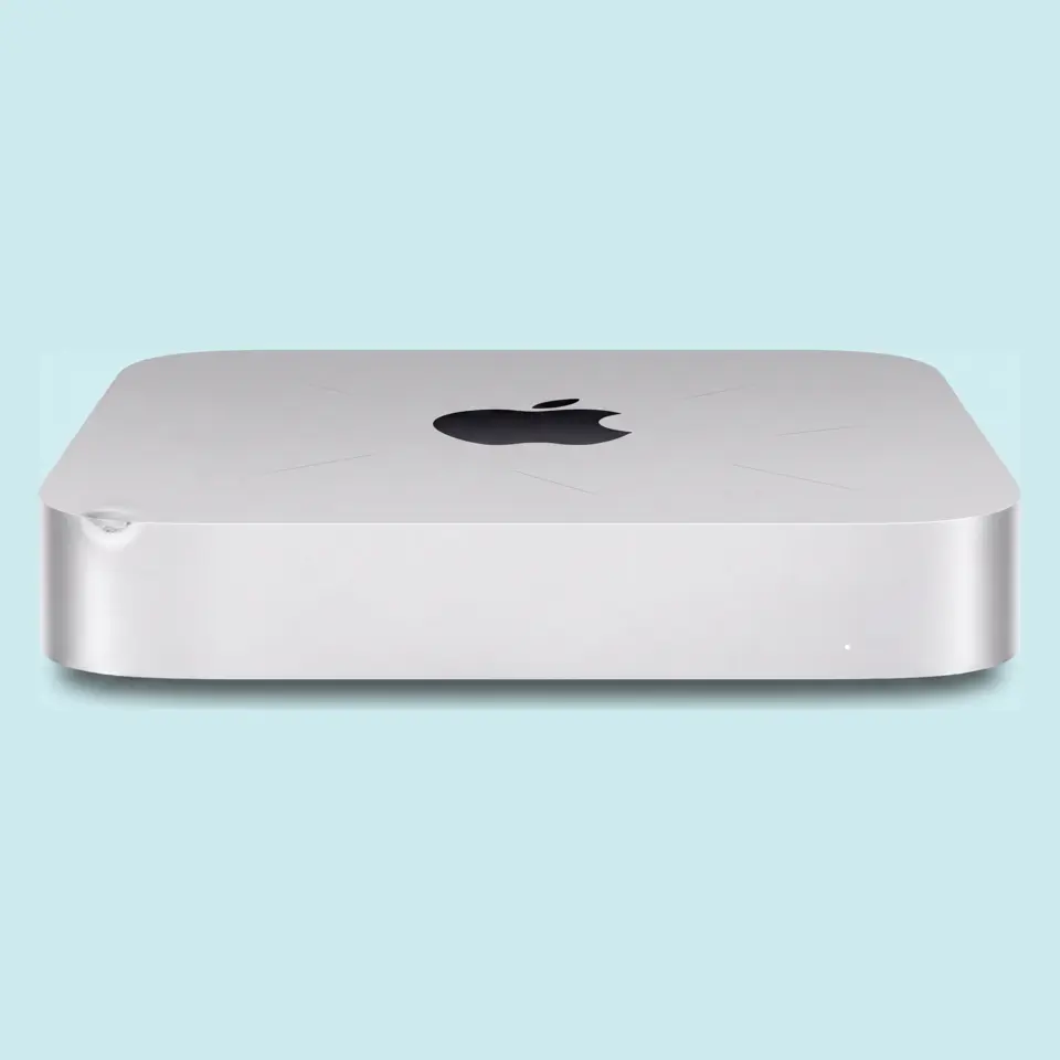 Grade C, Fair, shown on a Mac mini M2: Visible marks on body and screen
